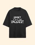 Black t-shirt with white text on a beige background