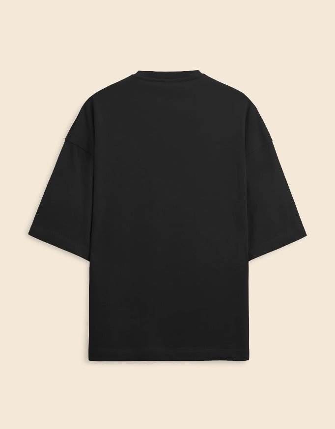 Black t-shirt on a beige background