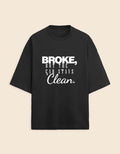 Black t-shirt with white text on a beige background