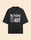 Black t-shirt with white text on a beige background
